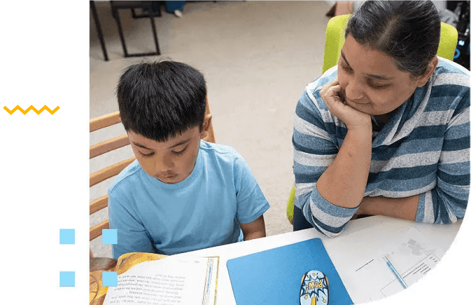 K12 Advanced and Gifted Learners picture 1 A woman helping her young son with his homework.